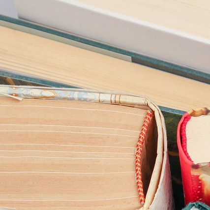 book binding hardcover stack closeup